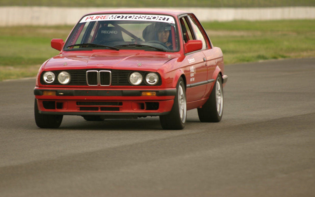 An E30 Running Hard at the Track